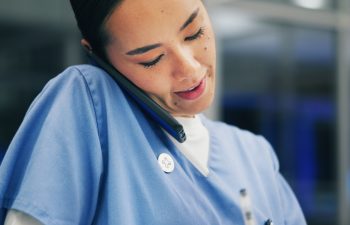 Phone call, writing and nurse or woman in hospital for ward clerk, icu emergency and medical records at night. Healthcare administration, surgery schedule and contact with person for overtime.