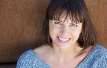 Close up portrait of a smiling middle aged woman